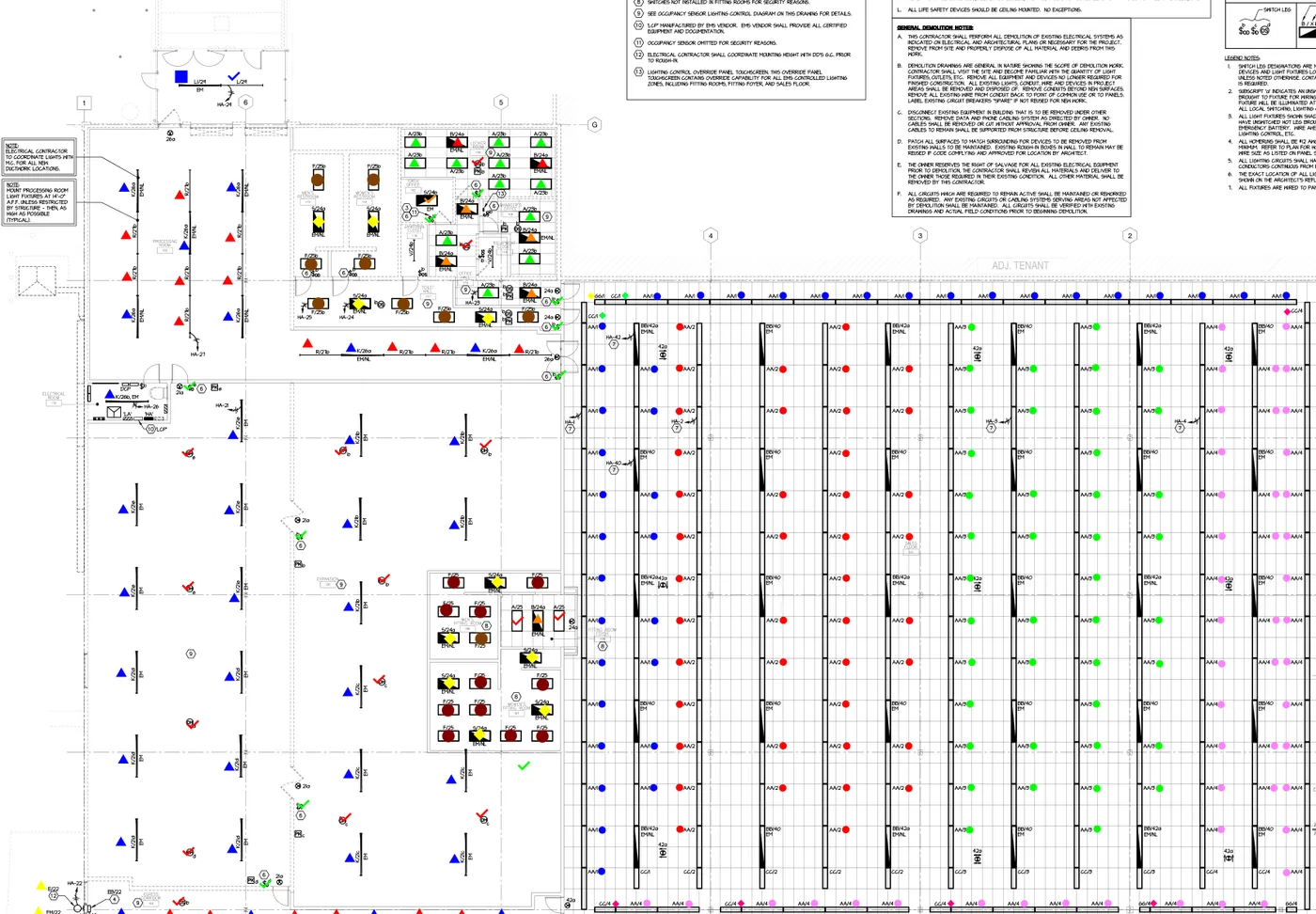 Electrical lighting plan for a retail store with every fixture marked in color and counted in an on-sheet legend
